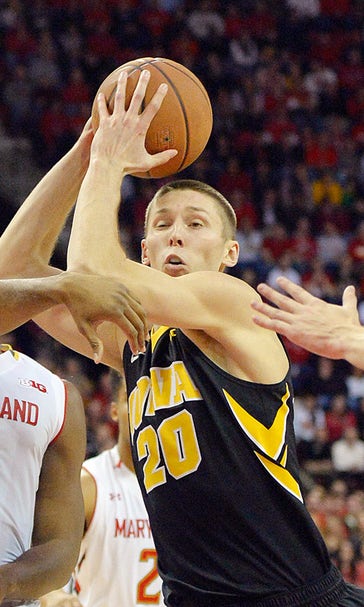 No. 8 Maryland squeezes past No. 3 Iowa 74-68